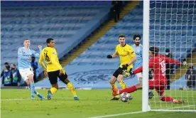  ?? Phil Foden scores the winner for Manchester City to give them a 2-1 first-leg victory over Borussia Dortmund. Photograph: Manchester City FC/Getty Images ??