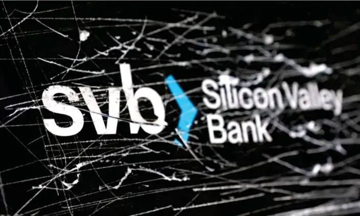  ?? Photograph: Dado Ruvić/Reuters ?? Economists say Silicon Valley Bank’s collapse will probably force banks to act more cautiously when issuing loans.