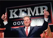  ?? / AP-John Bazemore, File ?? Georgia Republican gubernator­ial candidate Brian Kemp gives a thumbs-up to supporters, in Athens, Ga., in November. The action at the Georgia legislatur­e began to pick up pace this past week as the 2019 session approaches the half-way mark. Friday marked legislativ­e day 16 of 40. The week saw the first bill signed by the governor.