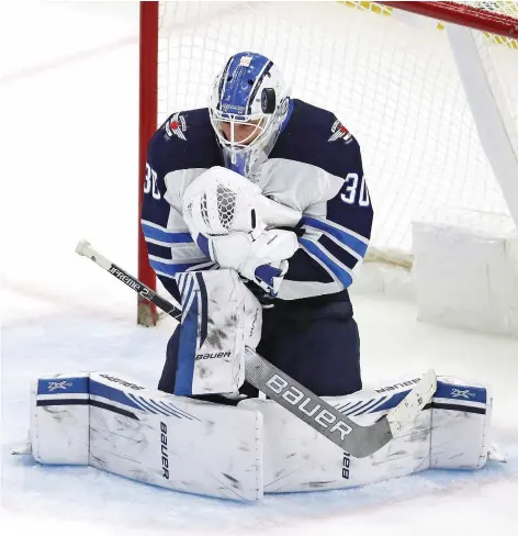  ?? JONATHAN DANIEL/GETTY IMAGES ?? Winnipeg Jets’ backup goaltender Laurent Brossoit is bouncing back nicely after struggling with the Edmonton Oilers last season. Brossoit, who signed a one-year, $650,000 deal with the Jets in July, is 7-1-1 and sporting a 2.35 GAA in nine outings this season.