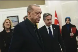  ?? BURHAN OZBILICI — THE ASSOCIATED PRESS ?? Turkish President Recep Tayyip Erdogan, left, talks to U.S. Secretary of State Antony Blinken during their meeting at Esenboga airport in Ankara, Turkey, on Monday.