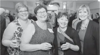  ??  ?? Angela Gurney, left, Linda Ryder, Sandy Grayson and Lorraine Tanner represente­d the Victoria Symphony