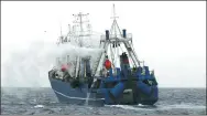  ?? AFP ?? Up: A krill fishing boat in Antarctic waters in 2017.