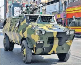  ?? AFP ?? An armoured carrier moves along the streets of Mandalay, Myanmar on Wednesday.