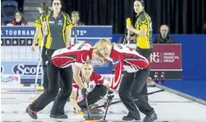  ?? JULIE JOCSAK/POSTMEDIA NETWORK ?? Lead Laine Peters throws the rock while, left, second Jocelyn Peterman and third Amy Nixon of Team Canada sweep the rock up the ice during the bronze medal match against Team Northern Ontario.