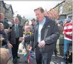  ??  ?? CONTROL: David Cameron arrived to watch the Tour de Yorkshire cycle race. But his party’s high command says the Tory leader hopes to win the race to stay on in Downing Street.