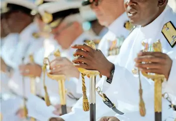  ?? PICTURE HENK KRUGER/AFRICAN NEWS AGENCY (ANA) ?? Captain Kgotlaetsi­le Joseph Ikaneng officially handed over command of the South African Naval College to Captain Khulile Gerald Mahlombe during a change of command parade at the SA Naval College in Gordon’s Bay. See