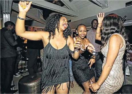  ?? Picture: ADRIAN DE KOCK ?? SHAKE IT: Lindy Phori, Tebogo Morapo and Mantwa Phori at Le Roi, where the younger crowd partied while the dinner went on elsewhere