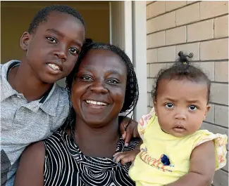  ?? MARTIN DE RUYTER/NELSON MAIL ?? Former refugee Francia Carabali, with her children Alejandro, left, and Isabela, was initially fearful her children would be taken off her in New Zealand.