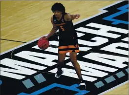  ?? PAUL SANCYA — THE ASSOCIATED PRESS ?? Oregon State guard Ethan Thompson says he knew “this success” was in the Beavers all season, despite the notion they were picked to finish last in the Pac-12 by the media.