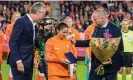  ?? Photograph: Gerrit van Keulen/EPA ?? The KNVB’s Jan Dirk van der Zee (left, with Daniëlle van de Donk) believes ‘more is needed than sticking to tradition and nostalgia’.