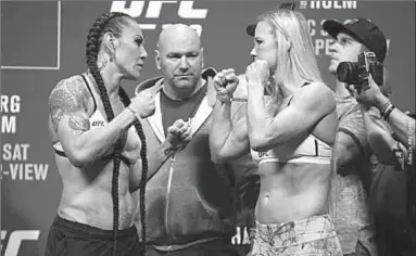  ??  ?? Cris Cyborg (left) versus Holly Holm (right). (Photo: Currenteve­nt)