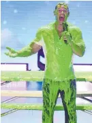  ?? Photo / AP ?? Host John Cena gets slimed at the 2018 Kids’ Choice Awards.