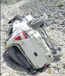  ?? HT PHOTO ?? A Zen Estilo car rolled down into the gorge at Theog in Shimla district on Sunday, killing all six occupants.