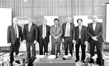  ??  ?? Dr Munir (centre) is seen with (from left) Dr Hans, Scheidig, Sheng, Marsh, Dr Hoe, and World Reserve Trust Strategic advisor Stephen Hill,at a roundtable titled ‘What Lessons Learned from Financial Crises of Recent Times’, organised by CARI, in...