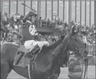  ?? The Sentinel-Record/Richard Rasmussen ?? AZERI ACE: Jockey Paco Lopez celebrates aboard Martini Glass after winning the the Grade 2 $350,000 Azeri Stakes for older fillies and mares Saturday at Oaklawn Park.