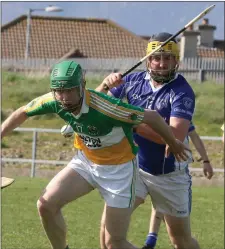  ??  ?? Mattie O’Connor of Duffry Rovers is first to the ball ahead of Our Lady’s Island’s Colm Kinsella.