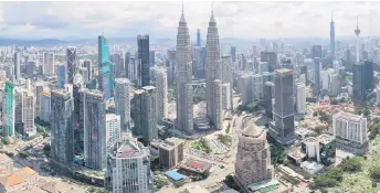  ?? ?? Awang Adek says the Malaysian economy remained resilient in 2023, supporting economic activity and intermedia­ting savings, despite global economic challenges and divergent monetary policies.
