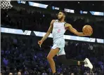  ?? NAM Y. HUH — THE ASSOCIATED PRESS ?? Miami Heat’s Derrick Jones Jr., an Archbishop Carroll grad, heads to the basket during the NBA All-Star slam dunk contest Saturday in Chicago,