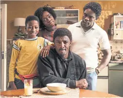  ?? THE NEW YORK TIMES ?? Elba, centre, with “In the Long Run” castmates Sammy Kamara, left, Madeline Appiah and Jimmy Akingbola. The series is streaming on CBC Gem.