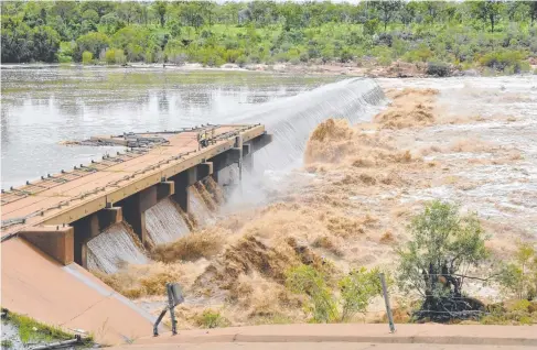  ??  ?? FULL FLOW: The flooded Burdekin River surging over the Charters Towers weir last month.