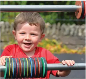  ??  ?? Two-year-old Daniel Walsh from Lios Póil in Dingle playground when it reopened on Monday.