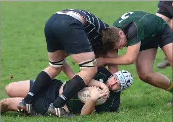  ??  ?? A Boyne forward tries to set up ruck ball after being brought to ground.