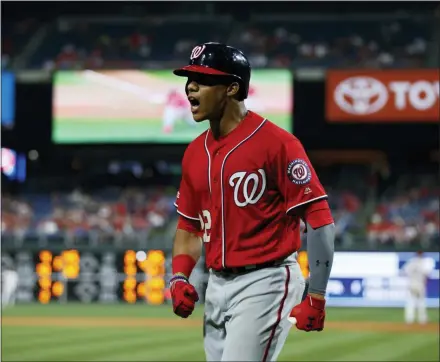  ?? MATT SLOCUM — THE ASSOCIATED PRESS ?? Washington Nationals’ Juan Soto reacts after hitting a two-run home run off Philadelph­ia Phillies relief pitcher Hector Neris during the ninth inning of a baseball game, Saturday, in Philadelph­ia.