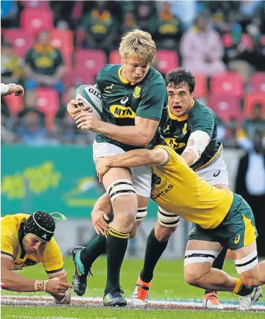  ?? Picture: WERNER HILLS ?? GOING FORWARD: Man of the match Pieter-Steph du Toit carries the ball during the Rugby Championsh­ip clash between South Africa and Australia at the Nelson Mandela Bay Stadium in Port Elizabeth on Saturday