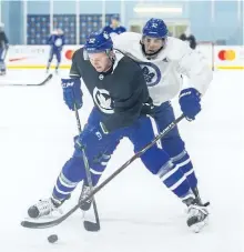  ?? ERNEST DOROSZUK/POSTMEDIA NETWORK ?? Martin Marincin (front) and Josh Leivo battle during practice, Monday in Toronto.