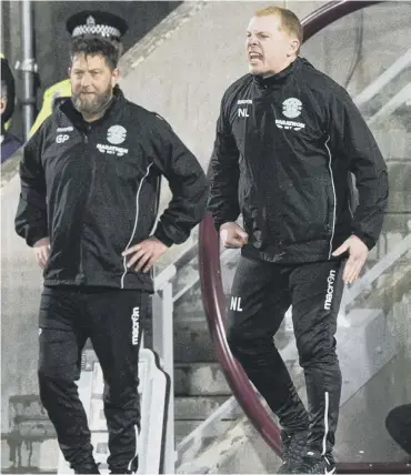  ??  ?? Garry Parker, left, had to stand in for Neil Lennon yesterday when the Hibs manager slept in.