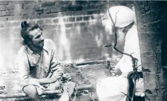  ??  ?? BHAGAT SINGH photograph­ed secretly at Lahore police station during his first arrest and detention from May 29 to July 4, 1927, in connection with the Lahore Dussehra bomb case (October 25, 1926), with Gopal Singh Pannu, DSP, CID, Lahore.