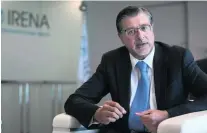  ?? Silvia Razgova / The National ?? Irena director general Adnan Amin says renewables investment has grown as technology costs have fallen.