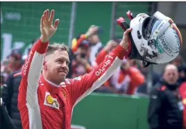  ?? (Photo EPA/MAXPPP) ?? Sebastian Vettel décroche sa pole position sur le fil. Une occasion en or de faire le break au championna­t se présente ainsi à lui...