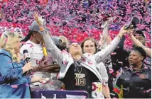  ?? ASSOCIATED PRESS ?? South Carolina head coach Dawn Staley celebrates after the Final Four women’s college basketball championsh­ip game against Iowa on Sunday in Cleveland. South Carolina won 87-75.