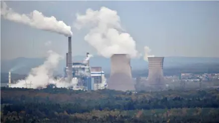  ?? AFP/VNA Photo ?? The combined gas and coal power station of Saint-avold, Moselle Province, France. Investors have called on government­s to compel companies to file financial accounts aligned with the world's net zero emissions target.