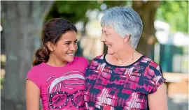  ?? CHRISTEL YARDLEY / FAIRFAX NZ ?? Jillian Littlewood, principal at decile 1 Crawshaw School in Hamilton with 11-year-old student Rosemarie Cameron.