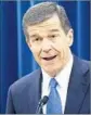  ?? Chris Seward News & Observer ?? GOV. ROY COOPER’S lawyers want to continue blocking a law that strips him of election oversight.
