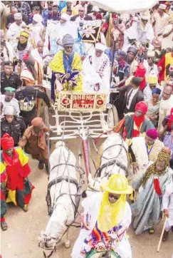  ??  ?? Emir of Ilorin, Alhaji Ibrahim Sulu Gambari returns to his palace with entourage after moving round with contingent­s of families of traditiona­l chiefs at the durbar