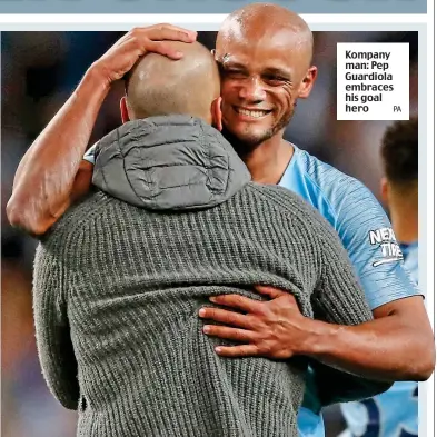  ?? PA ?? Kompany man: Pep Guardiola embraces his goal hero