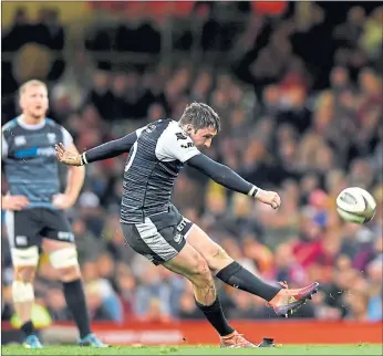  ??  ?? Sam Davies of Ospreys kicks the winning penalty