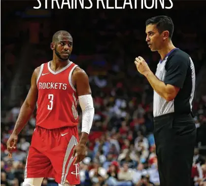  ?? Karen Warren / Houston Chronicle ?? Rockets guard Chris Paul talks with referee Zach Zarba during a game at Toyota Center in December. As president of the players’ associatio­n, Paul has learned to choose his words carefully when speaking about the referees publicly.