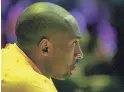  ?? STEPHEN DUNN/GETTY IMAGES ?? Kobe Bryant of the Lakers sits on the bench during pregame introducti­ons before a 2012 game against the Phoenix Suns.