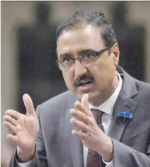  ?? ADRIAN WYLD/ THE CANADIAN PRESS ?? Minister of Infrastruc­ture and Communitie­s Amarjeet Sohi announced a new $4 million program to prevent radicaliza­tion in Alberta and address the root causes that lead to it.