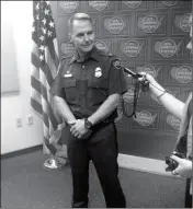  ?? PHOTO BY JAMES GILBERT/YUMA SUN ?? YUMA SECTOR CHIEF Anthony Porvaznik shares with reporters what he and President Donald Trump spoke about during the president’s visit to the Customs and Border Protection’s Office of Air and Marine hangar on Tuesday.