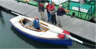  ??  ?? CLOCKWISE FROM LEFT Waiting for cockpit coamings; Alys has a sealed engine well in the aft buoyancy tank and recently gained an electric outboard; mast constructi­on; she floats!; racing during 2019’s Menai Straits Regatta