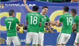  ?? — AFP ?? Mexico’s Rodolfo Pizarro celebrates after scoring against Honduras.
