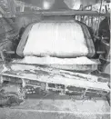  ?? STEVE MARCUS/LAS VEGAS SUN VIA AP ?? Technical grade lithium carbonate comes off a conveyor belt at the Silver Peak lithium mine near Tonopah, Nev., in 2017.