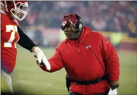  ?? CHARLIE RIEDEL — THE ASSOCIATED PRESS FILE ?? Kansas City offensive coordinato­r Eric Bieniemy, right, figures to be near the top of many of the lists of possible head coaching candidates this offseason.