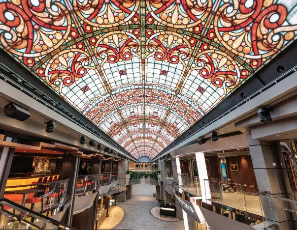  ??  ?? The stunning Galleria Meraviglia, the ship’s 315-foot-long central promenade.